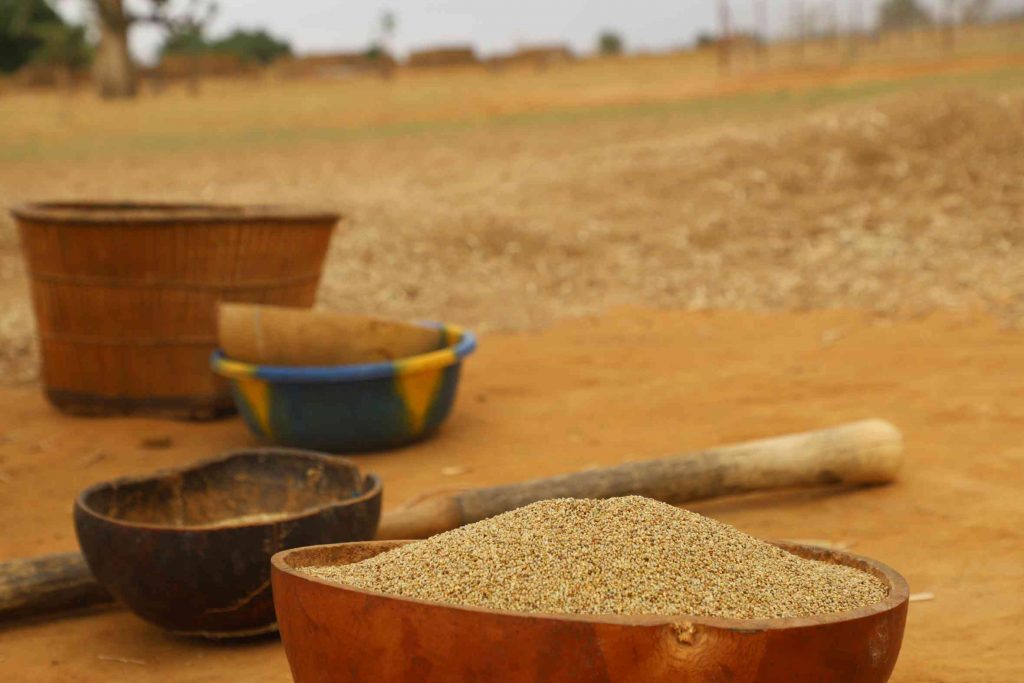 Buckets of foods: grain. In Mali at a World Vision Project